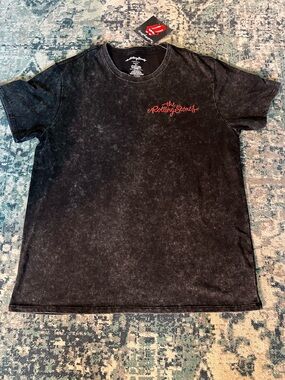 the Rolling Stones Black Mineral-Wash Short Sleeve Tee with Red Script Logo